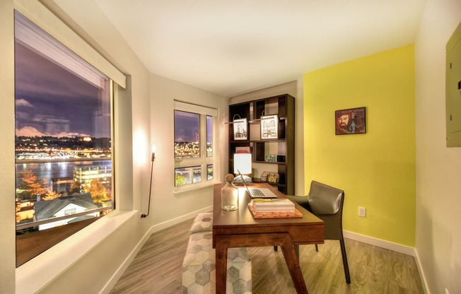 Office Area with View of Night Sky, Yellow Wall, Desk and Chair