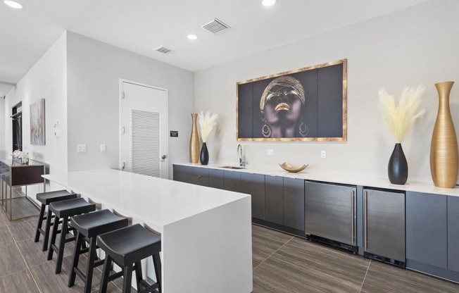 the residence on lamar apartment kitchen and bar with stools