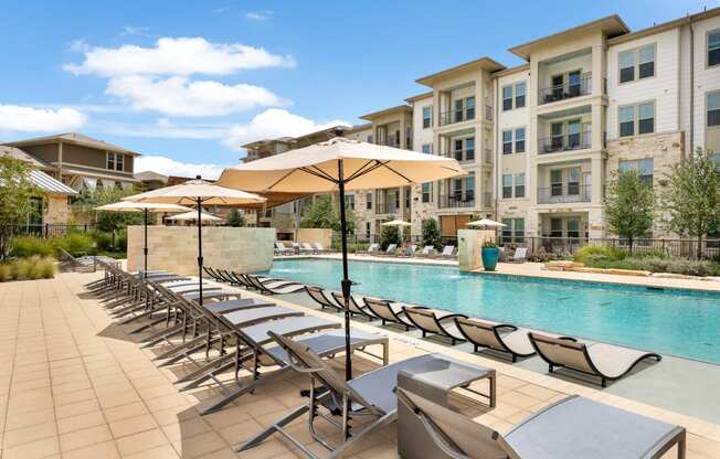 Expansive Pool and Sundeck with Tanning Ledge and Beach Entry