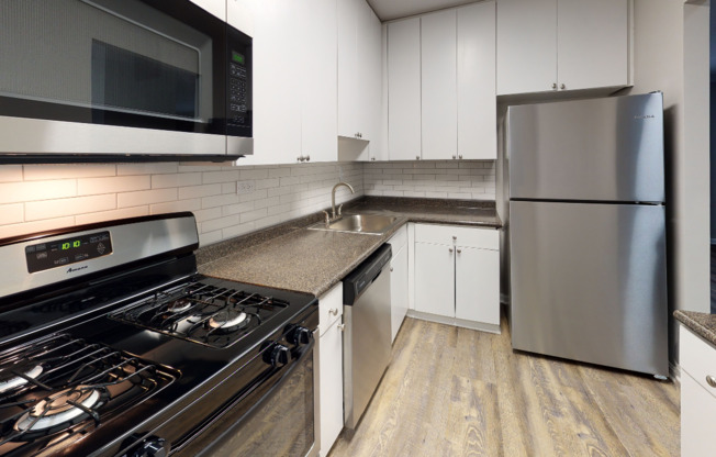 Subway tile backsplash, stainless steel appliances, and ample storage
