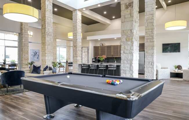 social lounge with billiards at The Allure apartments