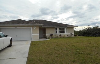 Charming 3 Bedroom 2 Bathroom Home in Lehigh Acres