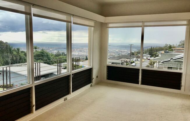 Large single family home with Ocean and city Views! Three covered parking stalls-Clean and bright home with 3 lanais
