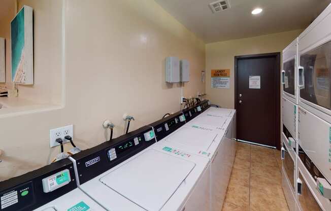 Laundry Care Centers at Huntington Cove Apartment Homes in Huntington Beach, California.