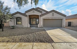 Single-level 4 bed, 2 bath home with tandem 3-car garage and RV gate.