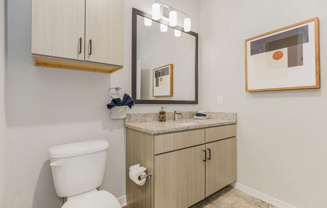 Bathroom With Granite Vanities