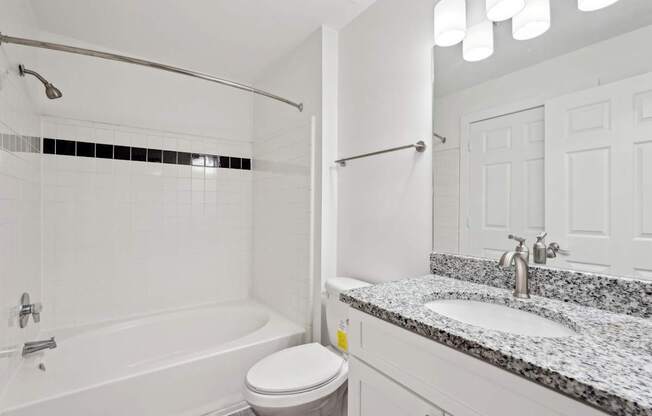 Bathroom with granite countertop