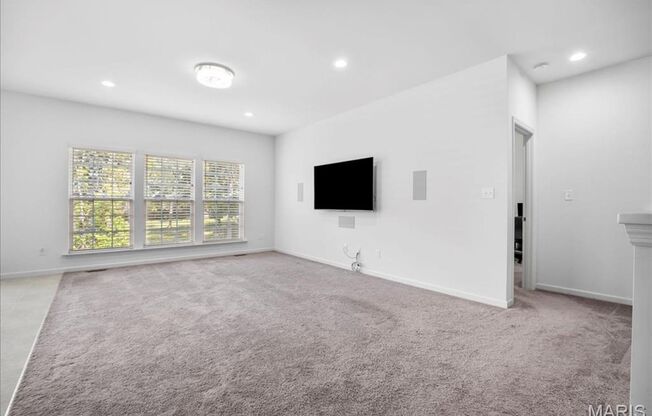 Stunning 3-bedroom, 2.5-bathroom home offers a spacious, open-concept floor plan