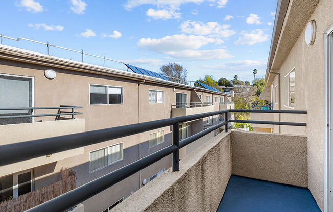 Private balcony with room for breakfast seating.