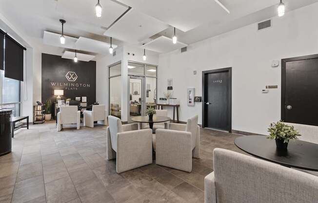 A modern waiting room with a black and white color scheme.