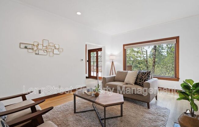 140 NW MACLEAY BLVD