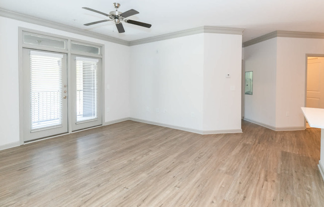 Living Room with Balcony and Hard Surface Flooring