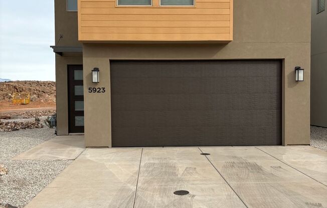 4 bed | 2 1/2 bath | 2 car garage in Desert Canyon with washer/dryer/fridge! Like New