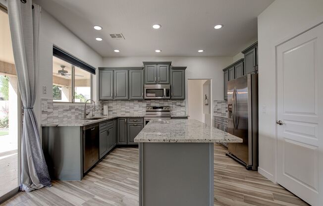 Huge 3 bedroom with A DEN AND LOFT!!!  Upgraded Kitchen!!!  Large Bedrooms!!!  Professionally landscaping which is gorgeous with Faux Grass!!!  READY NOW!!!