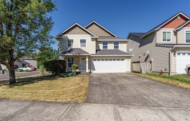 Your Next Home Awaits! 4BR/2.5BA with Fenced Yard & Garage