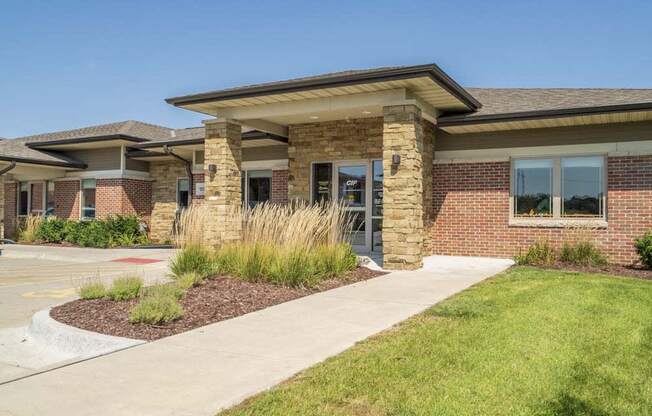 Leasing office entrance at Villas of Omaha townhome apartments in northwest Omaha NE 68116