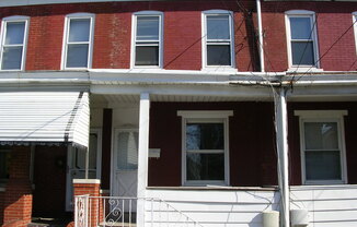 Great Home! Wood Flooring! Updated Kitchen! Wood Cabinets! Granite Counters! Great Living Space! W/D Hook-ups! Lots of Storage!