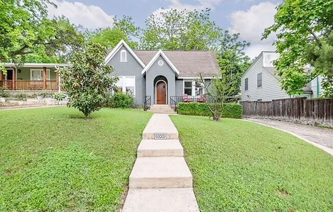 Beautiful Tudor Style Home in highly desirable neighborhood.