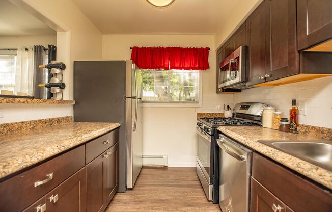 a modern kitchen with stainless steel appliances