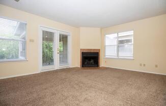 a living room filled with furniture and a flat screen tv