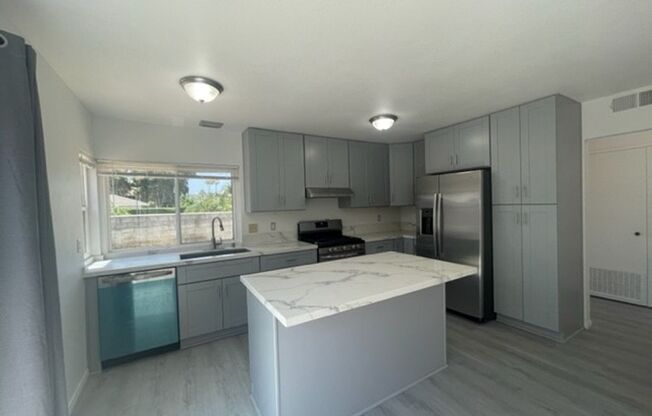 Recently remodeled throughout 3 bedrooms, 2 bath with large yard in Westwood community!