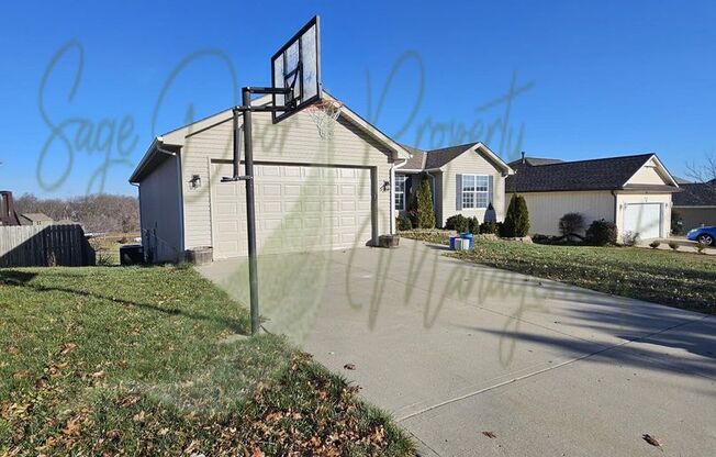 STUNNING GRAIN VALLEY HOME!!!