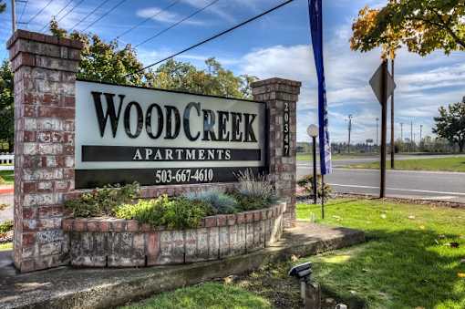 Property Signage at Woodcreek Apartments, Fairview