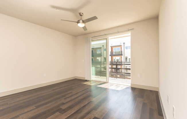 Living Room with Balcony and Hard Surface Flooring