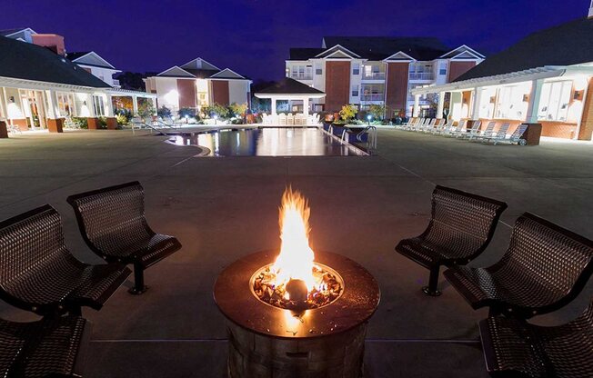 outdoor firepit at night social and entertaining spaces at 1200 Acqua