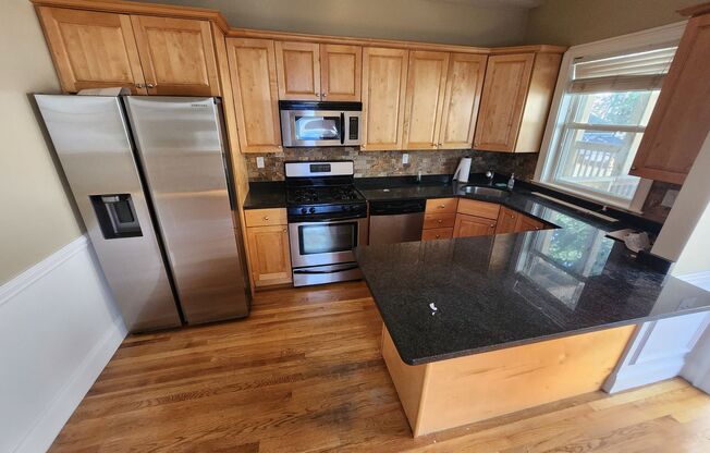 Bi Level Rehabbed 2 Bd 2 Bath With Laundry & Private Deck Condo in Southie Available 9/1