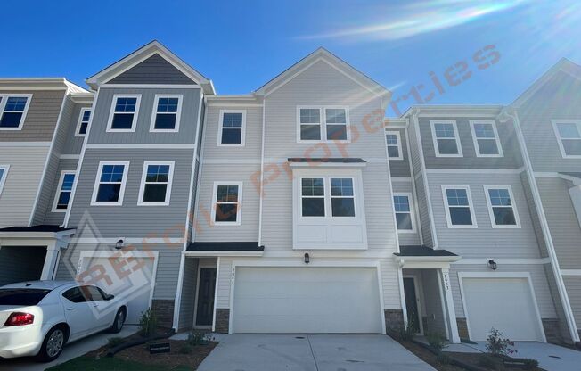 Stunning 4 Bedroom 3.5 Bath, 3 Story Townhome with First Floor Guest Suite in Lockwood Subdivision, Durham, Available February 7th!