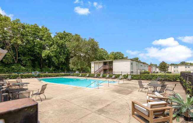 our apartments have a large pool and lounge chairs