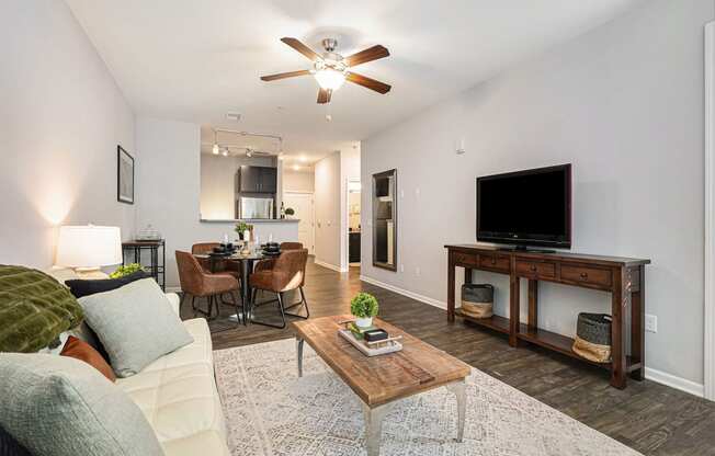 a living room with a couch and a tv