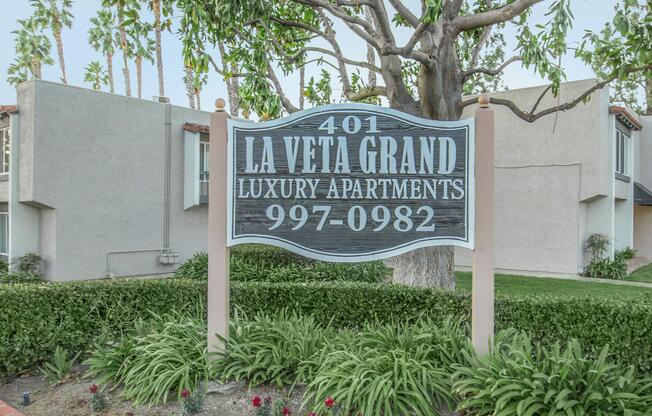 a sign in front of a house