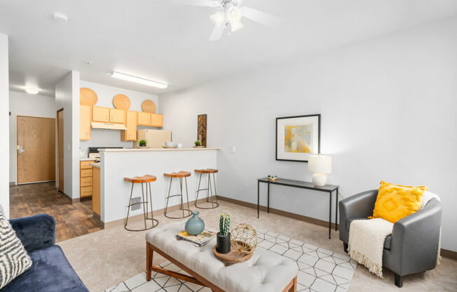 Living Room With Kitchen View at Fifth Avenue Place Apartments, Portland, 97209