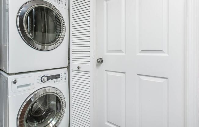 a microwave oven sitting on top of a door