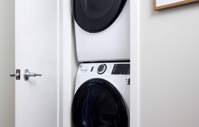 Enjoy the convenience of an in-home, full-size washer and dryer at Modera Clarendon, making laundry days effortless and efficient.