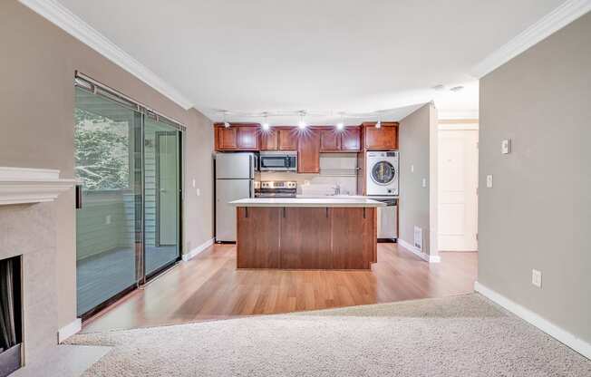 Living Room & Kitchen at Whispering Brook Apartments, Des Moines, WA,98198