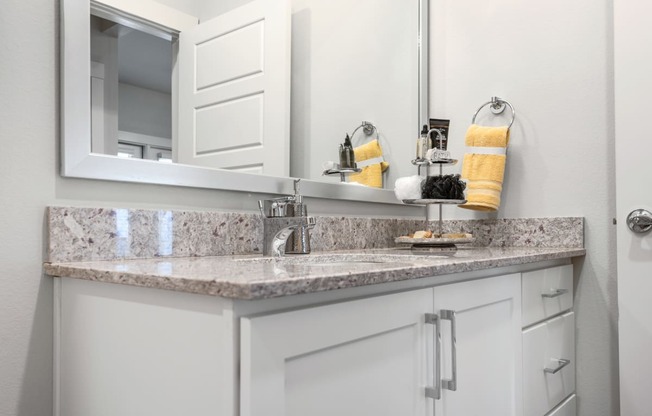 bathroom area of an apartment at ironridge at hill country village