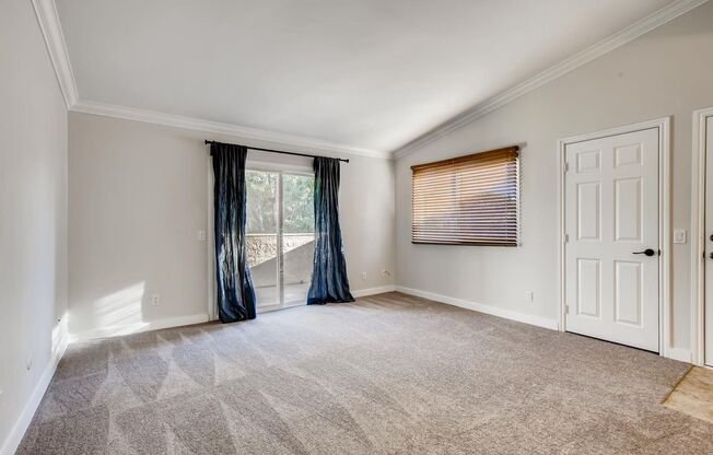 Spacious 2BR/2BA Top-Floor Condo in Gated Stonemark Community