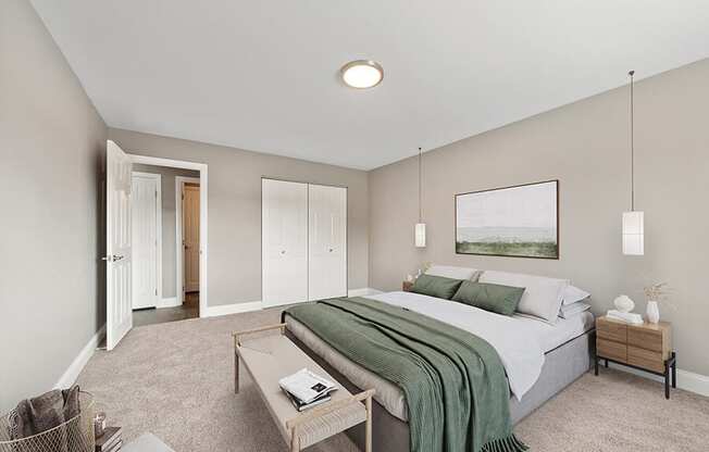 Model Bedroom with Carpet and Closet  at Heights at Marlborough Apartments located in Marlborough, MA.