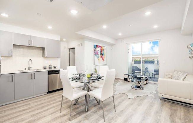 Dining area with wood inspired flooring, recessed lighting, Open kitchen, living room on the right