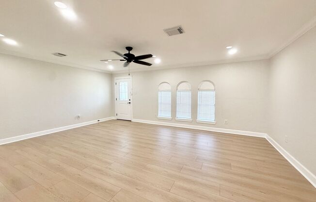 Elegant 3/2/2 home with lots of Updates in Angleton!