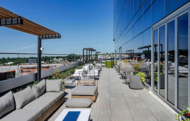 3thirty3 new rochelle ny apartment high rise photo of outdoor terrace with multiple seating areas