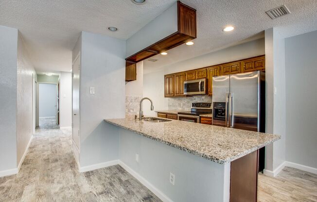 2-Bedroom Condo in Garland - Private Patio & Two Car Garage