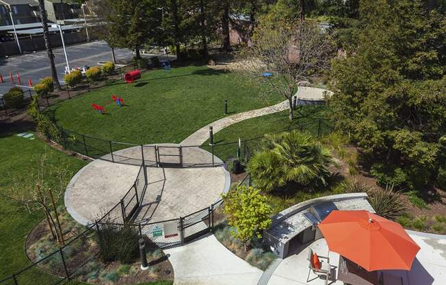 Campbell Apartments-Parc at Pruneyard-Gated Dog Park with Paved Walkways, Equipment, and Greenery