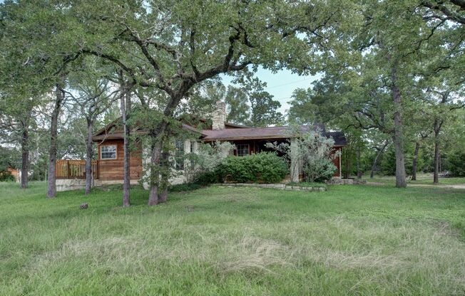 Available for August Move in! Acreage with a stocked pond, all in the heart of South College Station!