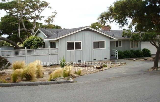 Charming 3-Bed 2-Bath Home Located In Pebble Beach Community with Fireplace and Large Back Yard