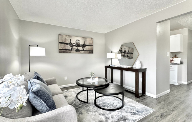 Spacious living rooms with abundant natural lighting offer the perfect place to relax or entertain