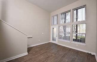 Living Room With Expansive Window at Russellville Commons, Oregon